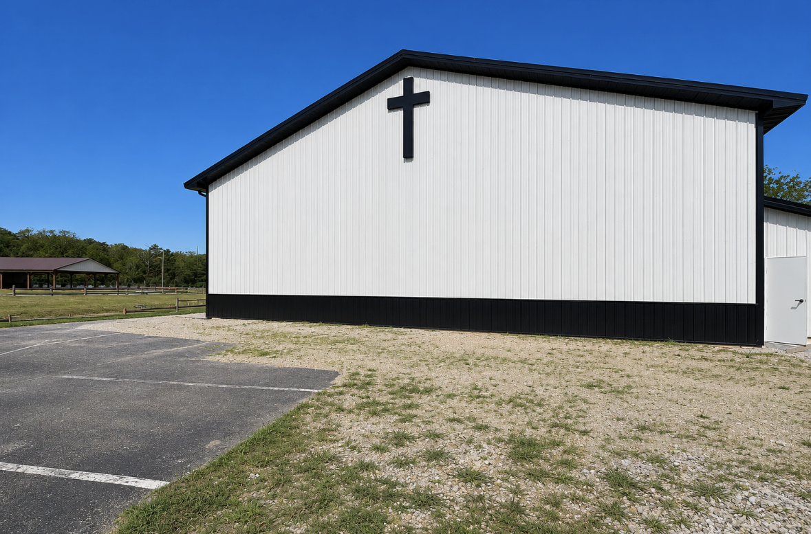 Dimensional cross signage installed on white church building